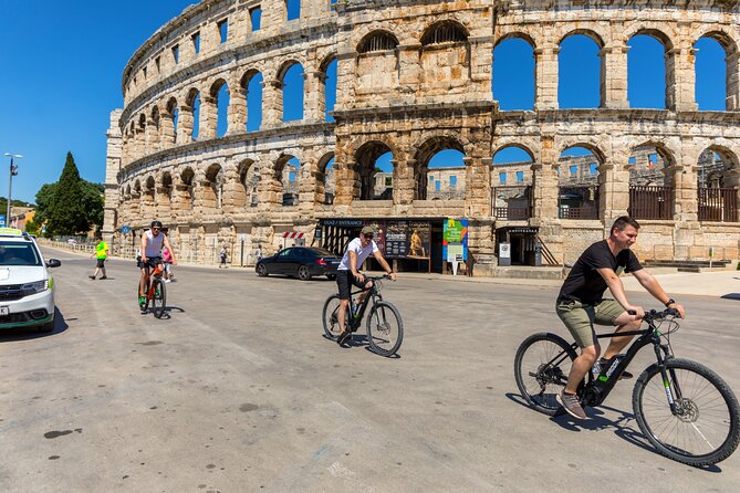 Pula E-Bike Tour: From Verudela to Pula City Center - Stop 1: Pula Arena and its four preserved side towers