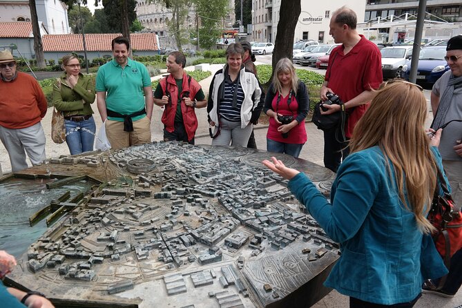 Pula Empire Secrets Exploration Game and Tour - Arch of the Sergii: Roman carvings and a riddle about power