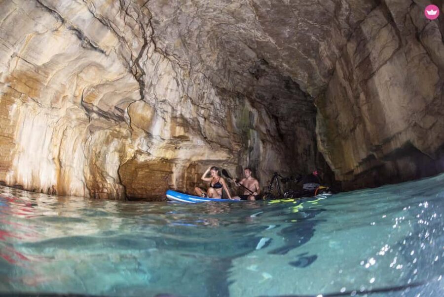 Pula: Swimming & snorkeling Boat Tour - The first swim stop: calm bay, clear water, and easy entry
