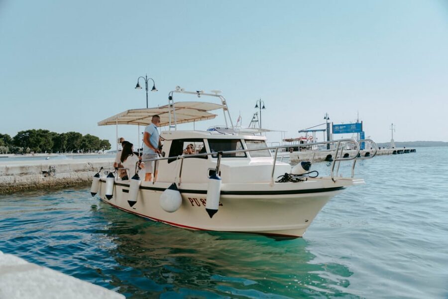 Pula: Swimming & snorkeling Boat Tour - Snorkeling near an island with local marine life