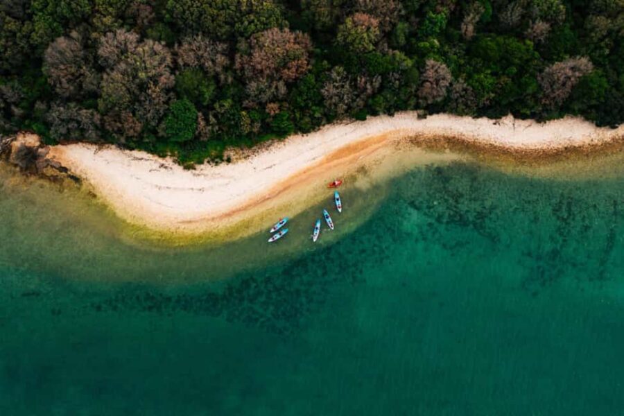 Pula: Three Island Kayak Tour with Cave Photo & Snorkeling - The island hopping leg to Fraškerić (Otocic Frasker)