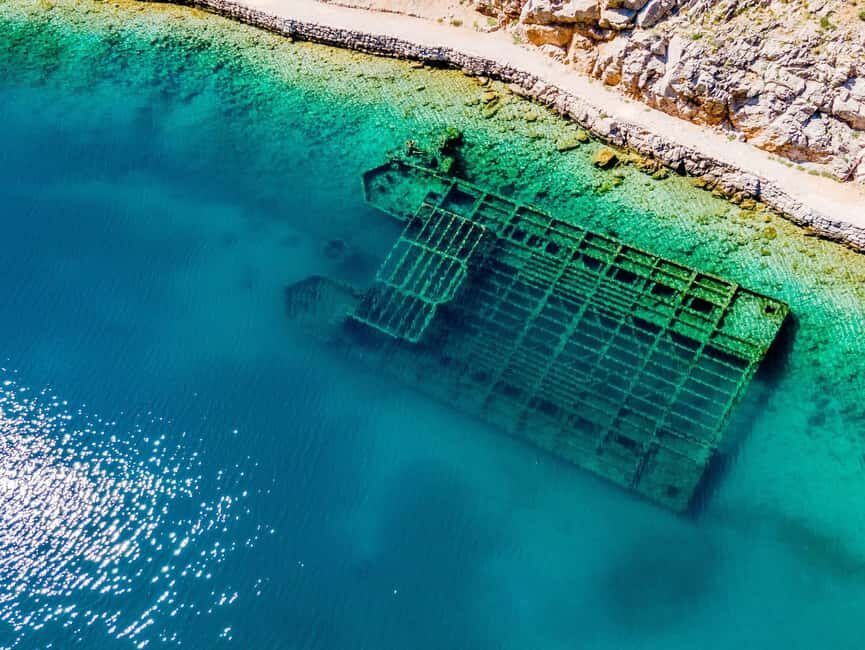 Rab: Zavratnica, Goli Otok and Sveti Grgur Boat Tour - Goli otok + lunch: the prison island stop that becomes your break