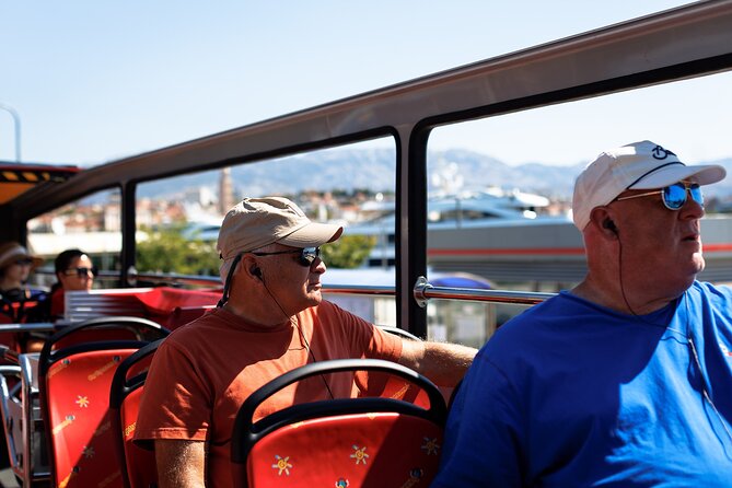 Red Line: Split Panoramic Tour with Sightseeing Bus - Bačvice: where local beach energy meets the classic tourist photo