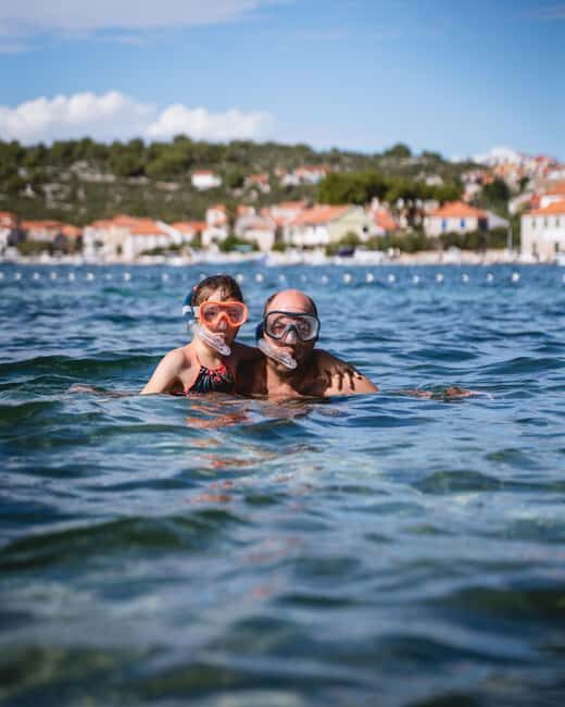 Šibenik: Archipelago Boat Tour with Snorkeling & Wine - Snorkeling in Clear Bays With Gear Provided
