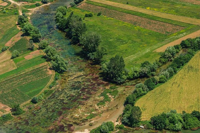 Sinj: Panoramic Flight over Peruca Lake and Dinara mountain - Peruća dam, then the Cetina River approach