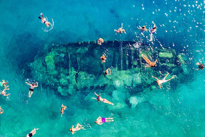 Split: Blue Lagoon, 3 Island Boat Tour & Mediterranean Lunch - The Boat Experience: Seating, Toilets, Music, and Group Size