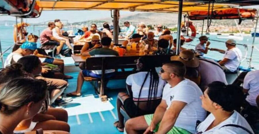 Split: Blue Lagoon Boat Trip with Lunch, Wine and Snorkeling - Blue Lagoon at Krknjaši: Clear Water, Sandy Bottom, and UNESCO Status