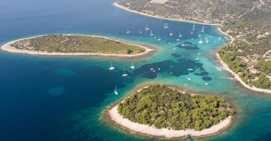 Split: Private Full Day Boat Trip to Blue Lagoon and Trogir - Entering Trogir the right way: UNESCO streets, coffee, and a quick reset