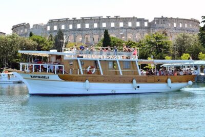 Sunset Dolphin Cruise in Brijuni National Park from Pula - Pula Arena and Uljanik shipyard: the outward route you shouldn’t skip