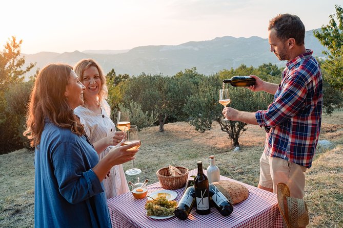 Sunset wine tasting in vineyard - Olives, bread, and the snack setup that makes the tasting feel complete