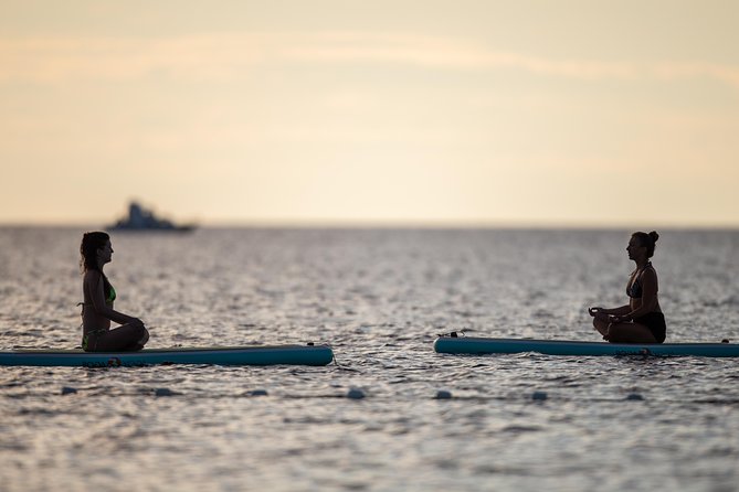 SUP Yoga in Pula: Flow on Water - SUP Yoga on the Pula Coast: What Makes It Different