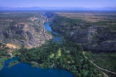 The Wonder of nature route - Panoramic Flight over Plitvice Lakes & Krka NP - First Stop in the Air: Krka Falls and the Visovac Monastery Island