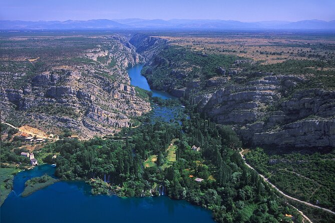The Wonder of nature route - Panoramic Flight over Plitvice Lakes & Krka NP - First Stop in the Air: Krka Falls and the Visovac Monastery Island