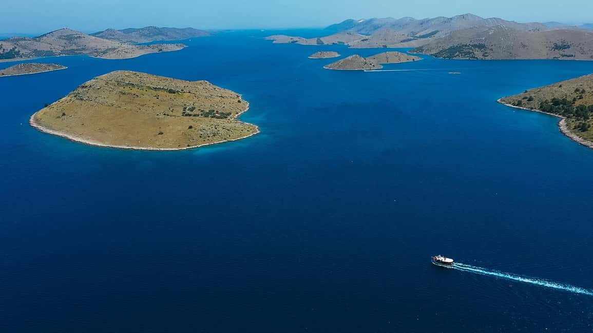 Zadar: Boat Tour to Kornati Secluded Bay, Local Life & Lunch - The Boat Experience: traditional vintage charm, with one real tradeoff