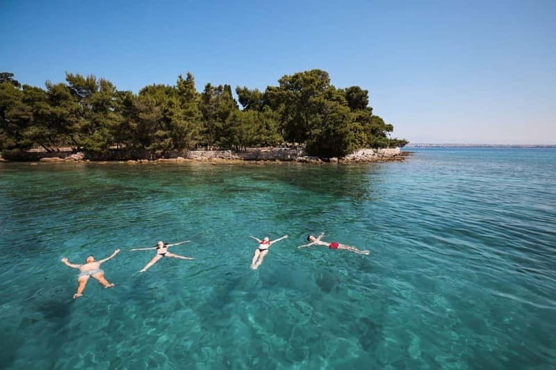 Zadar: Half Day Island Hopping Tour With Snorkeling - The ride experience: communication, music, and family-friendly pacing