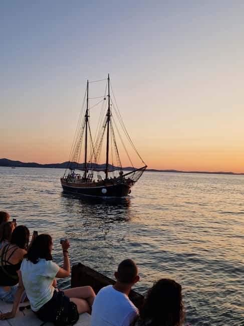 Zadar: Sunset Cruise on Traditional Boat with Wine - Music, photos, and the right way to work the deck