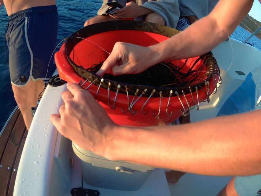 Zadar: Sunset Fishing Half-Day Guided Boat Trip - What happens at the viewpoint stop: photos, beer, swimming, snorkeling