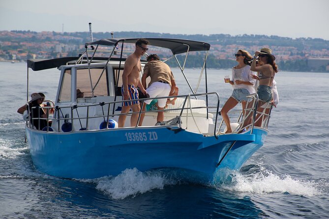 Zadar Sunset Tour by Boat with Wine and Snacks - That in-between moment: Greetings to the Sun lights up