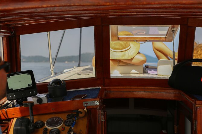 Zadar Sunset Tour by Boat with Wine and Snacks - Cruising past Zadar’s coastline walls (the “secret sauce” view)